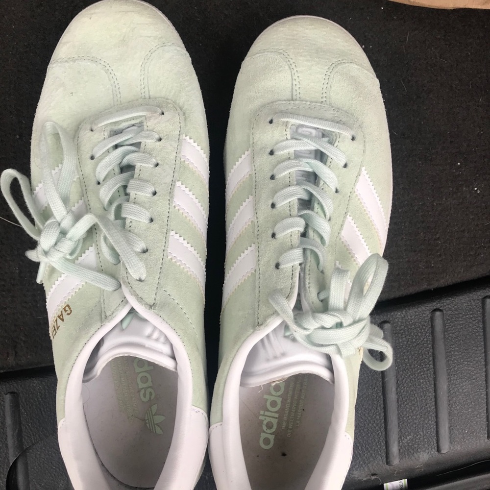 Mint green adidas shell toe shoe